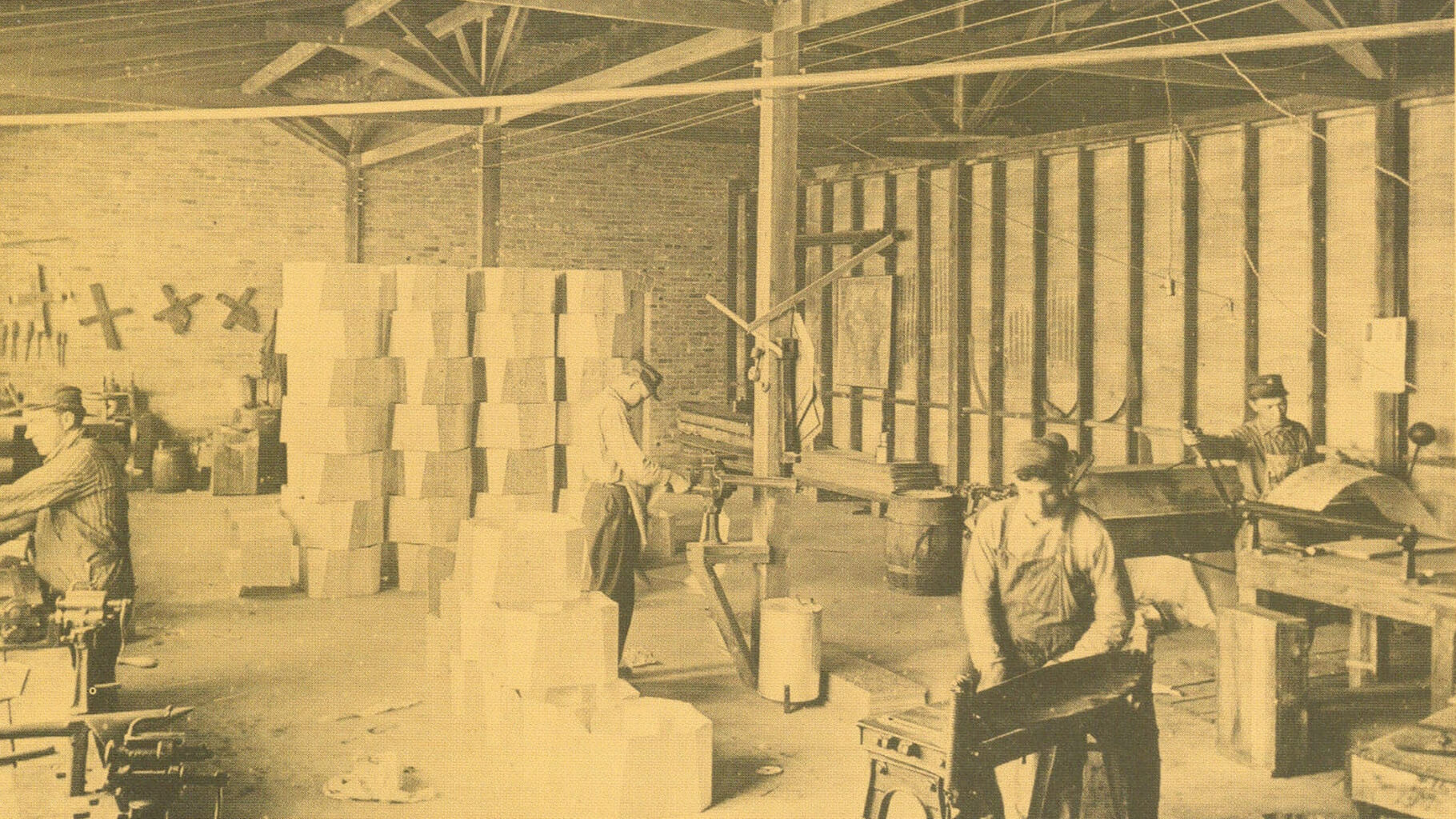 Historic photo of Alliance laundry machines being manufactured