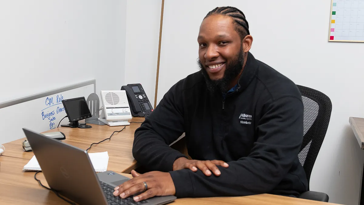 Alliance Distribution employee smiling